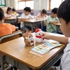 product-s3-squirrel-snowman-talking-reading-machine small-scale product use